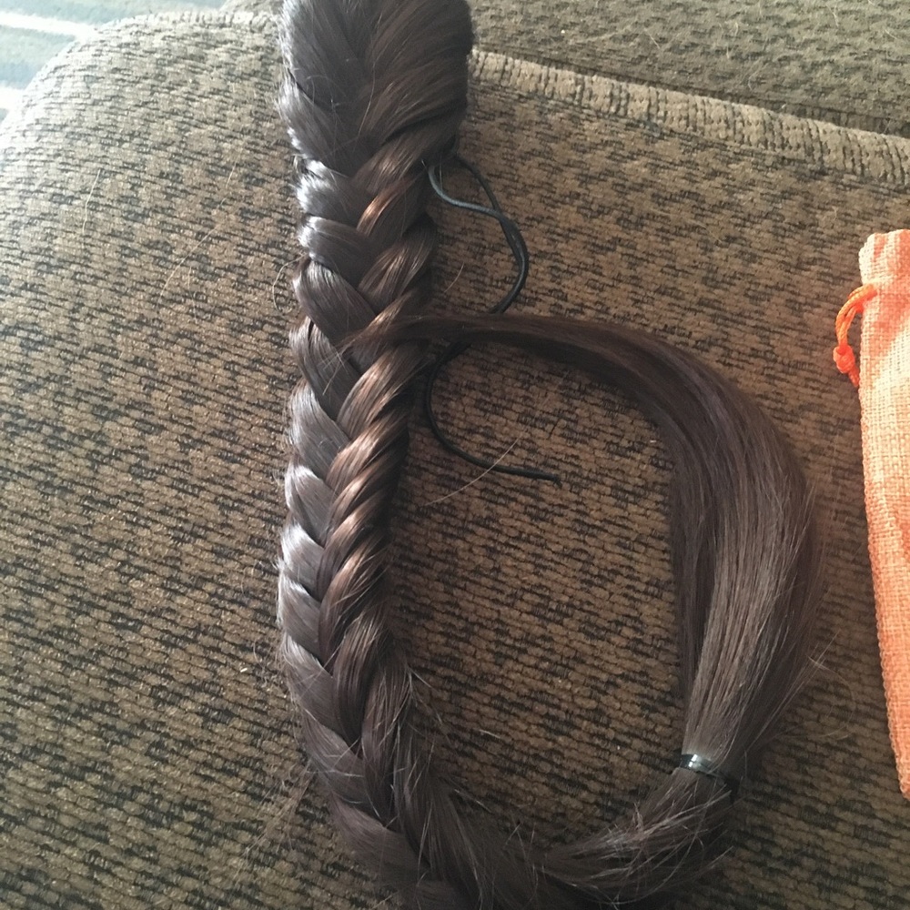 23” braided hair piece. Brown with red tones